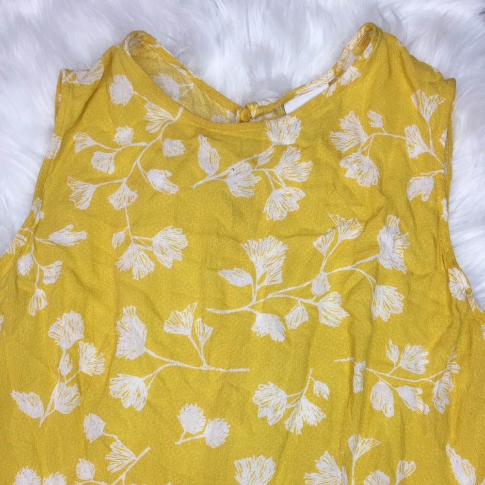 Sleeveless Peplum floral blouse